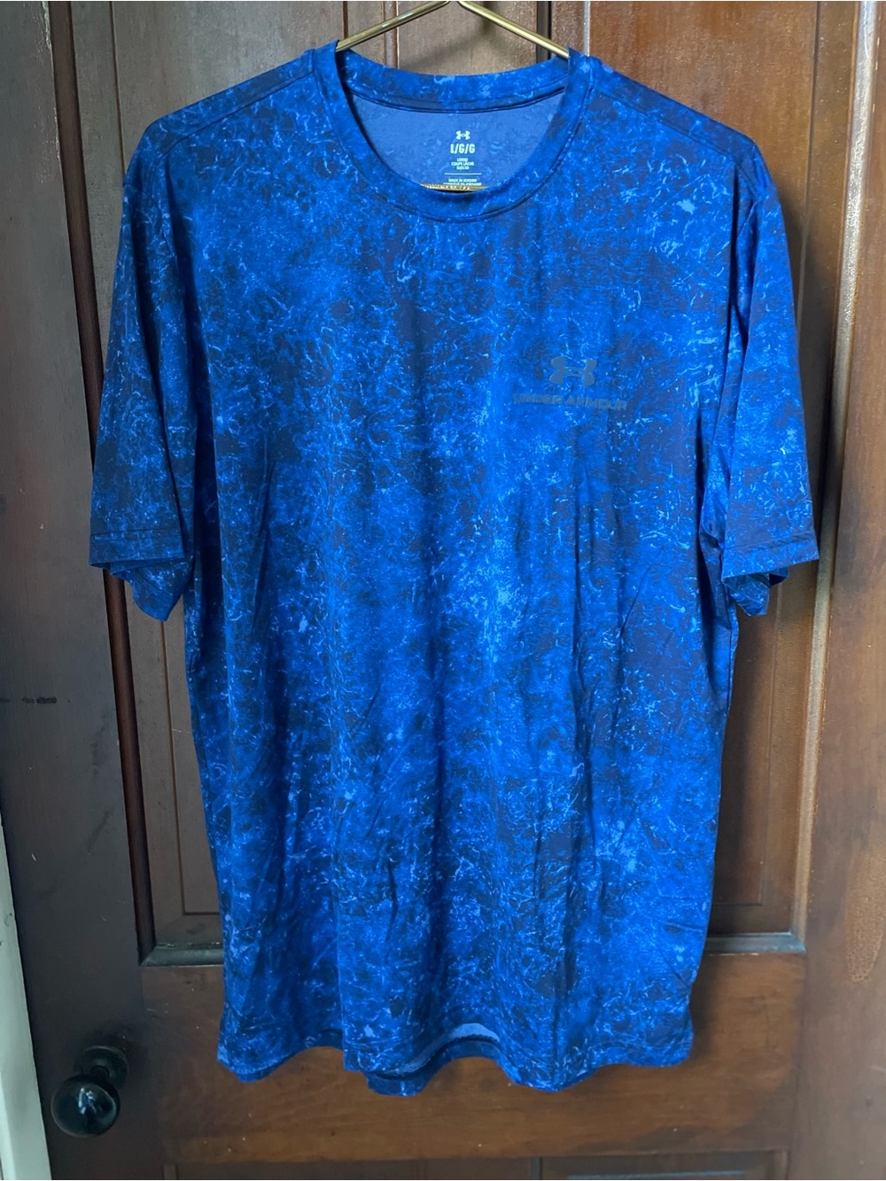 Under Armour men's large loose blue athletic shirt